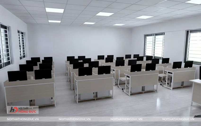 Bàn máy tính kê thành dãy trong phòng tin học