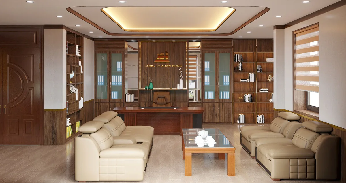 Khu tiếp khách trong phòng giám đốc với bộ sofa và bàn trà